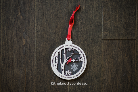 Cardinal ornament with a frosted acrylic background