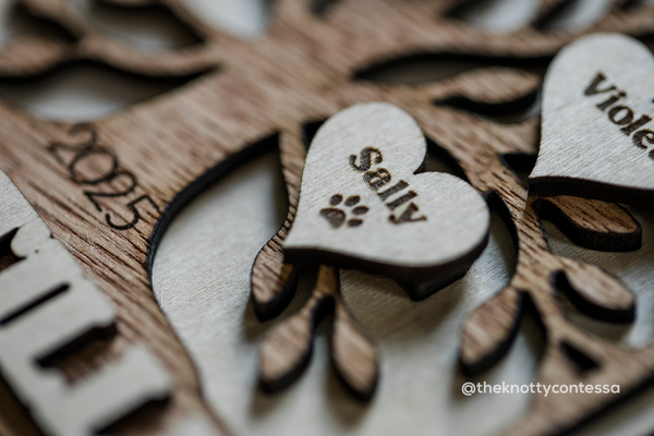 Close up shot of the engraving for a cat's name